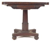 A late 19th century Victorian mahogany card table having a folding felt top with carved and