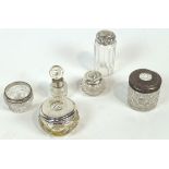 A group of six silver and white metal mounted cut glass items, to include a salt and a hair tidy,