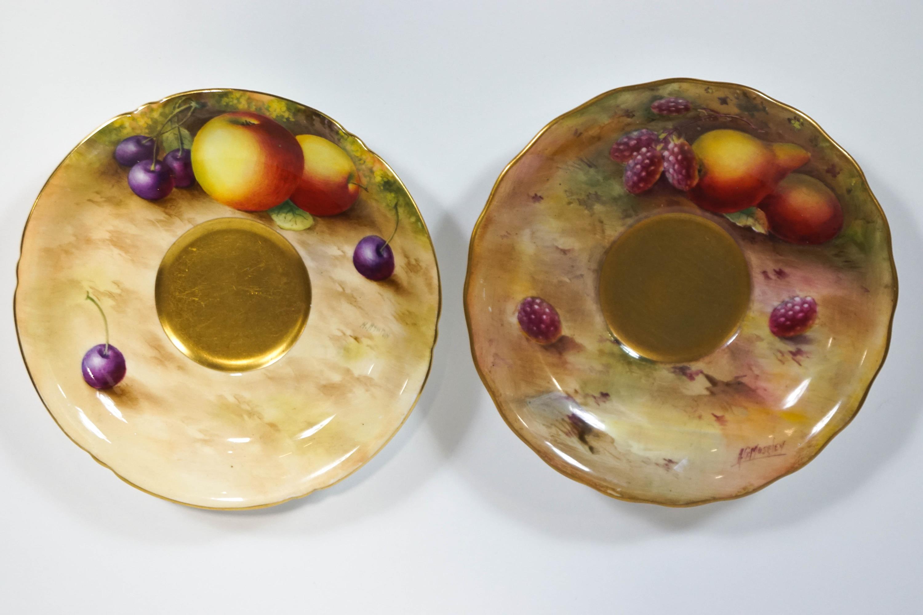 Two Royal Worcester saucers decorated with painted fruit, signed by Ayrton and Moseley,