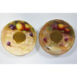 Two Royal Worcester saucers decorated with painted fruit, signed by Ayrton and Moseley,