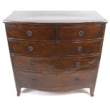 A 19th century mahogany bow front chest of two short and three long drawers with splayed feet,