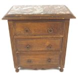 A miniature marble top cabinet, in the Continental manner, the edge with egg and dart carving,