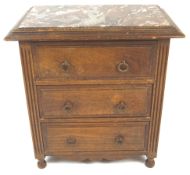 A miniature marble top cabinet, in the Continental manner, the edge with egg and dart carving,