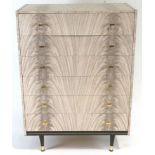 A Retro chest of drawers, of plain rectangular form, finished in melamine,