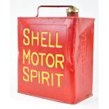 A metal Shell motor spirit can with brass cap, finished in red,