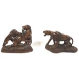 An African teak wood carving of a lion pair, 27cm high,