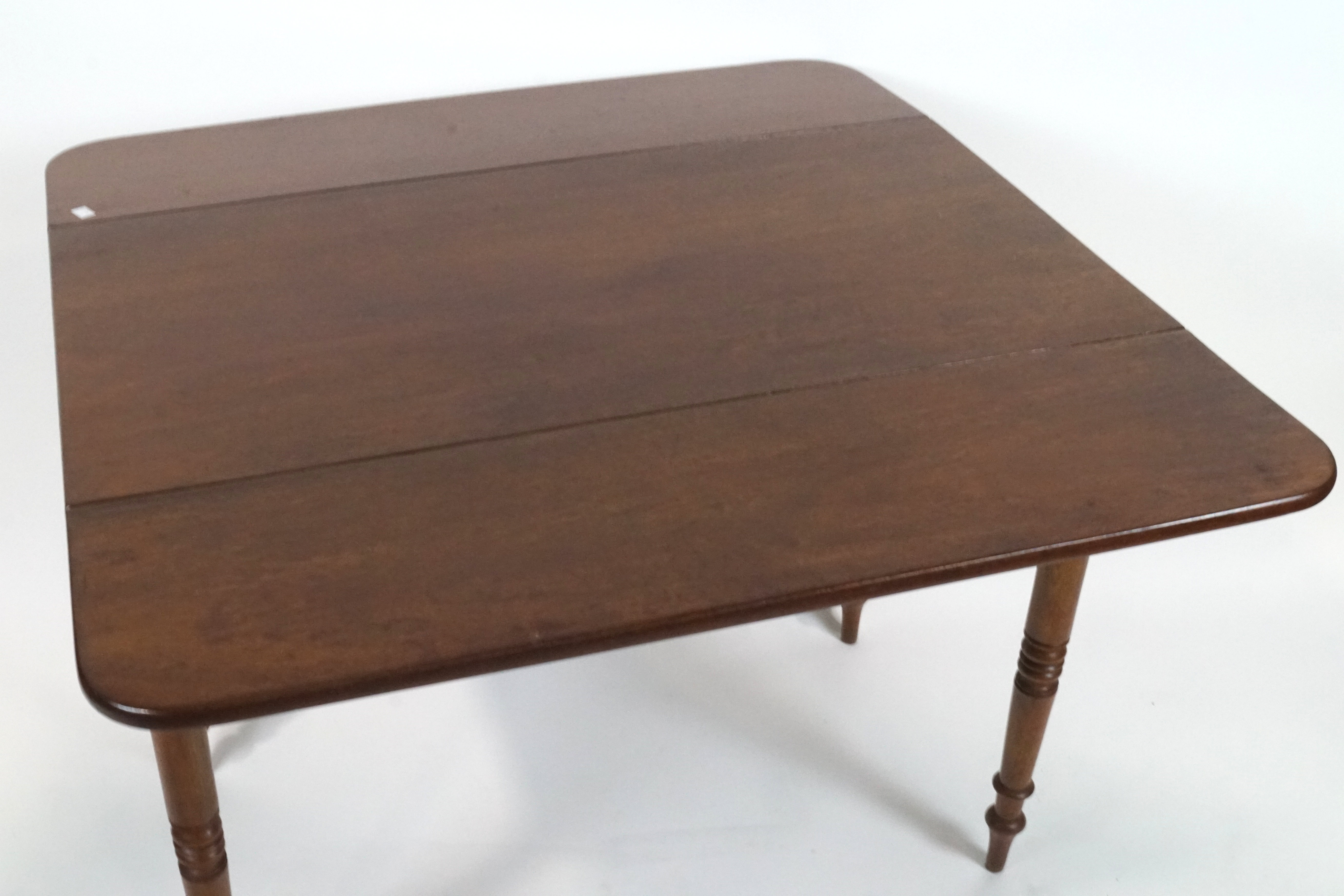 A Victorian mahogany Pembroke table with one frieze drawer on turned tapering legs, - Image 3 of 3