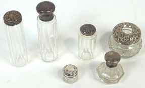 A group of six silver and white metal mounted cut glass items