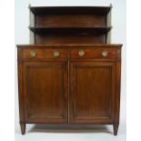 A Regency mahogany and brass mounted chiffonier,