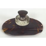 A tortoiseshell and cut glass ink stand with silver mounts,