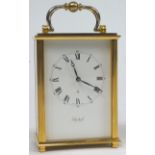 An 'Imhof' brass rectangular section carriage clock, eight day with fifteen jewel lever,