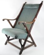 A late 19th century Victorian mahogany armchair,