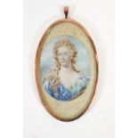 English School, Portrait of a lady in 18th century style, watercolour, in gilt locket frame,