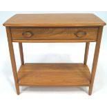 An Ercol elm wood rectangular side table (model No 1187) with shaped rectangular top