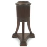 A carved mahogany George III style plant stand the cylindrical fluted stand