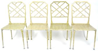 A set of four gold finished cast metal dining chairs, the backs in the form of bamboo lattice work,