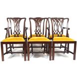 A set of six mahogany Georgian style dining chairs, to include two carvers,