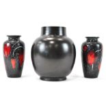 A large Poole pottery plain black glazed baluster form vase, 26cm high,