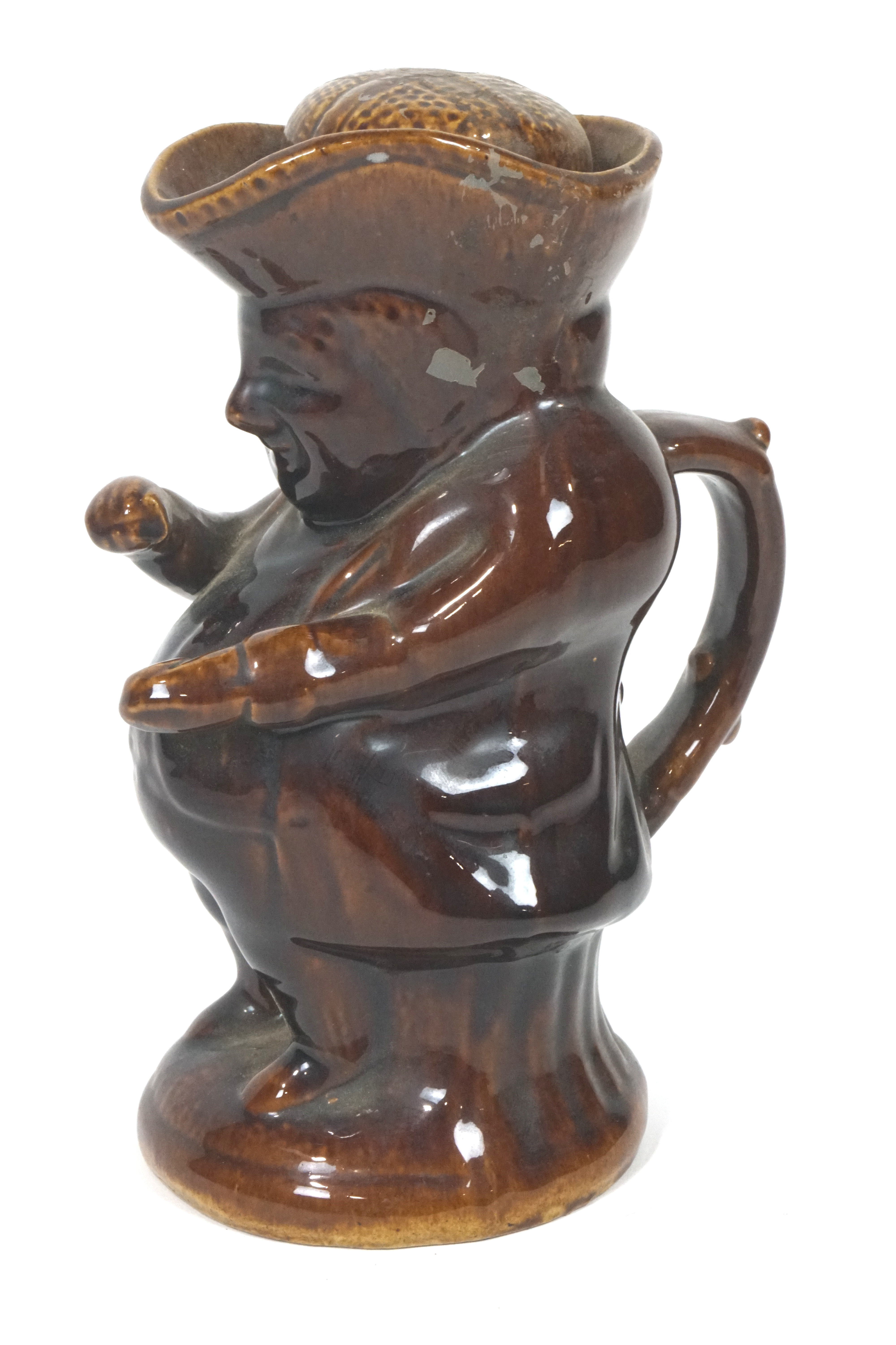 Two Staffordshire pottery treacle glazed Toby jugs and a teapot and cover, 19th century, - Image 4 of 4