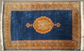 A Persian style rug,