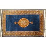 A Persian style rug,