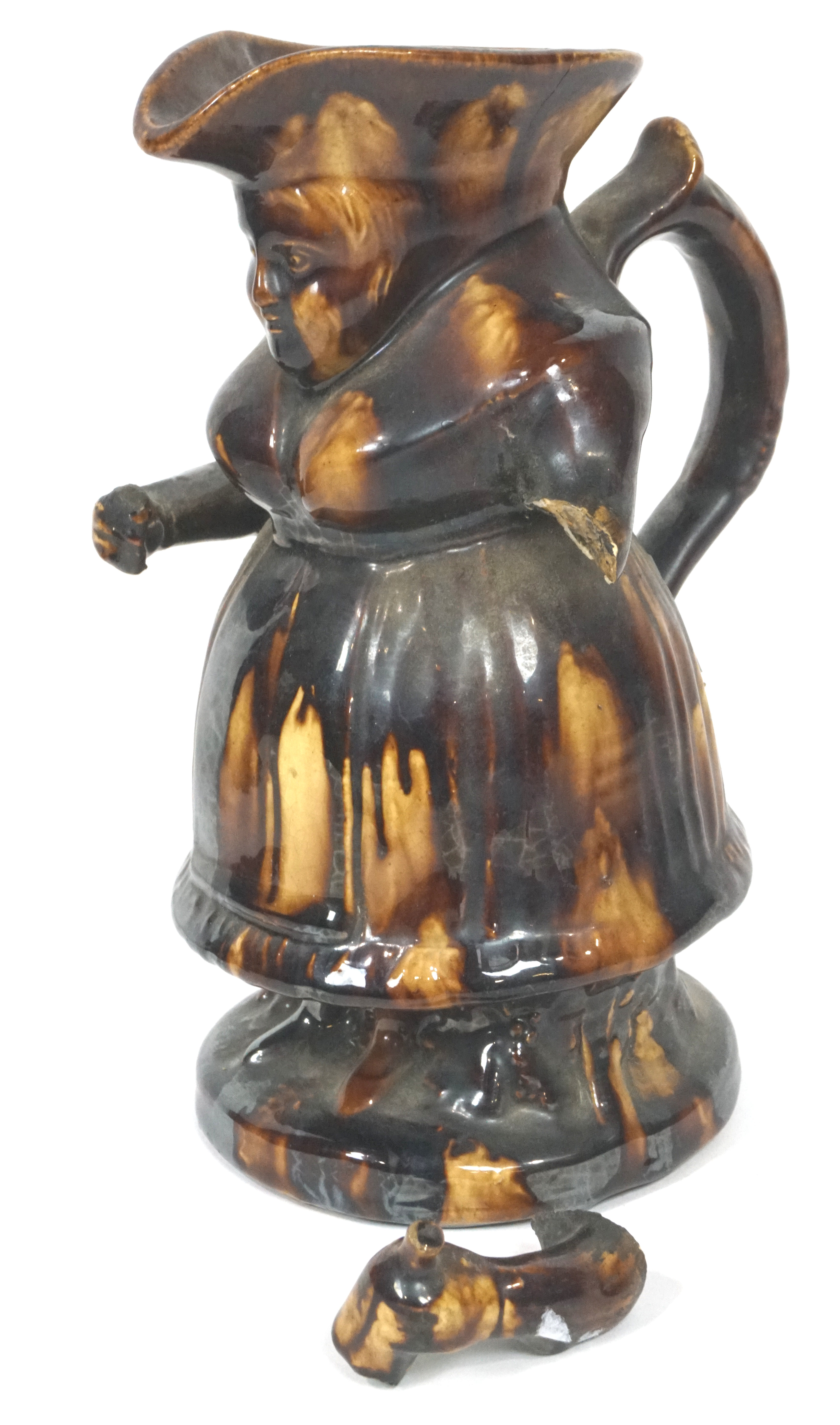 Two Staffordshire pottery treacle glazed Toby jugs and a teapot and cover, 19th century, - Image 3 of 4