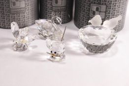 Three Swarovski glass figures : a butterfly, 5cm high; a mouse, 4cm high; and a swan,