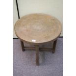 A brass tray table