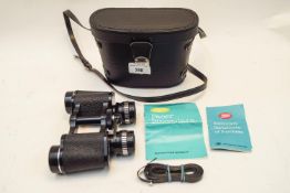 A pair of Boots Pacer 8 x 30 binoculars, fully coated Optics, with case, lanyards,