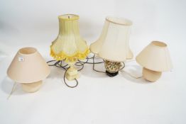 A marble lamp and three others