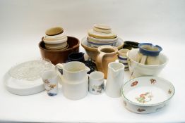 A group of mixing bowls and other items