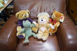 A Harrods Annual teddy bear and three others