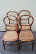 Four wicker seated chairs