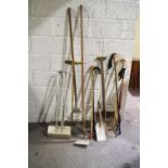 A collection of tools and walking sticks