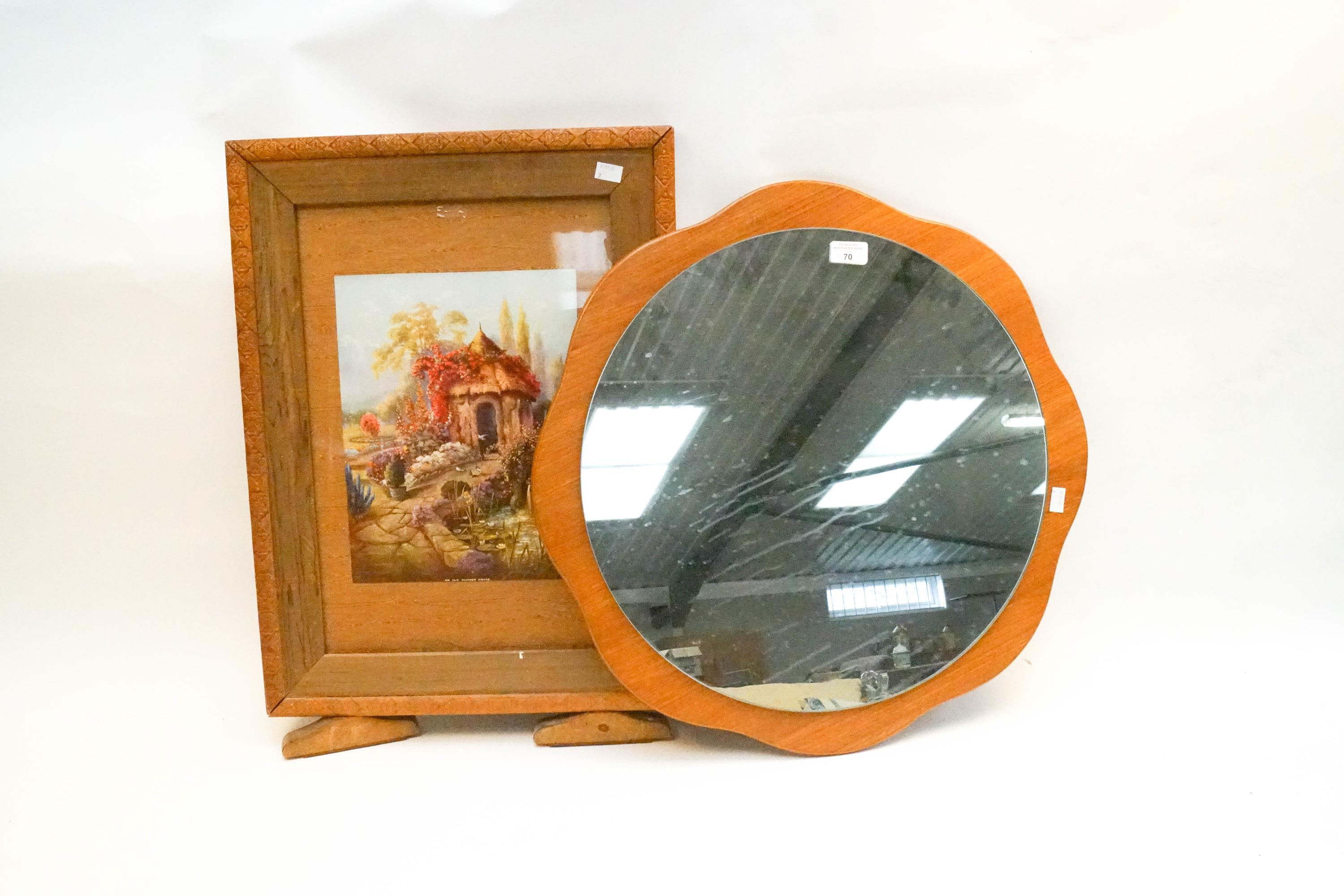 A fire screen and a mirror