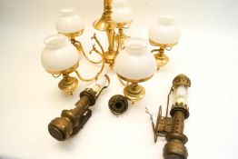 Two GWR carriage lamps and a three branch ceiling light