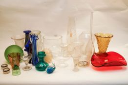A streaked blue glass vase and other glassware items