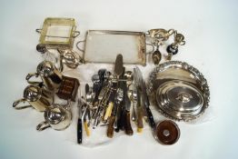 A silver two handled trophy, approximately 240 grams of weighable silver flatware,