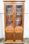 A mahogany display cabinet