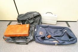 A group of holdalls and attache cases