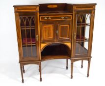 An early C 20th mahogany display cabinet with satinwood band inlay, with two glazed side cupboards,
