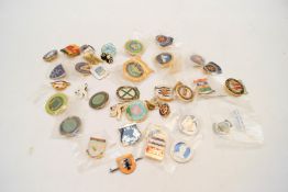 A collection of bowling club badges