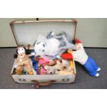 A quantity of toys in a suitcase