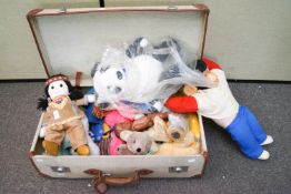 A quantity of toys in a suitcase