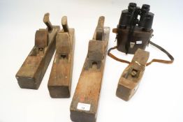 Four wood planes and a pair of binoculars