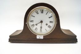 A wood mantel clock