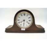 A wood mantel clock