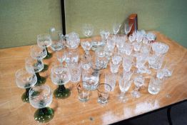 A collection of crystal and other drinking glasses