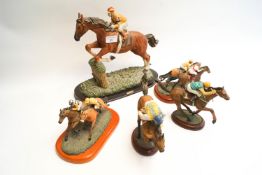 Five racing figures