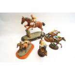 Five racing figures